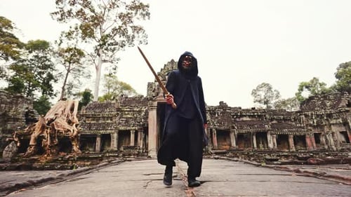 Masked Figure with Sword at Ancient Temple