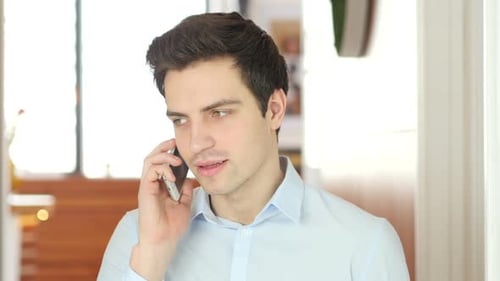 Phone Talk Man Answering Call in Office
