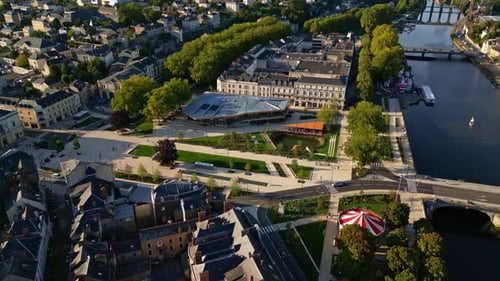 Aerial View of European Town Square River and Green Urban Park