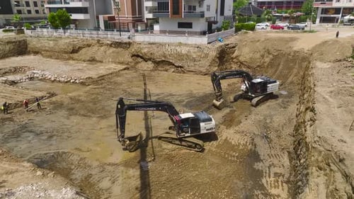 Aerial View Laying First Concrete Heavy Equipment in Action
