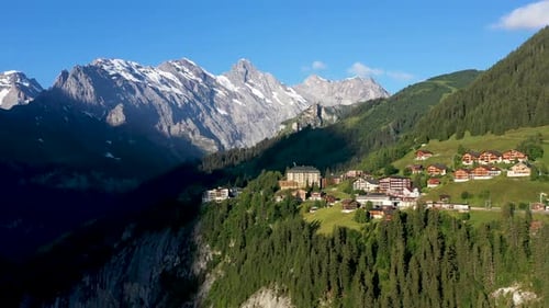 Cinematic drone shot of Murren, a traditional Walser mountain village in the Bernese Highlands of Sw