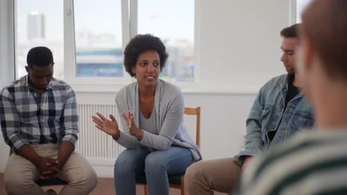 Group Therapy Session with Diverse People Talking