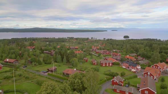 Scenic Red Timber Houses Of T llberg Sweden A Picturesque Lakeside scenic-red-timber-houses-of-t-llberg-sweden-a-picturesque-lakeside