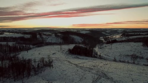 Snowy Landscape at Sunset Aerial View