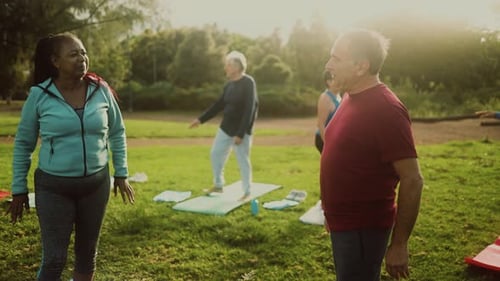 Senior people doing workout activity in a public park - Health elderly people lifestyle