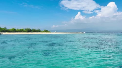 Idyllic Tropical Beach Panorama with White Sand and Turquoise Waters in Bali