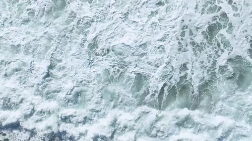 Beautiful Snow White Texture of the Sea Wave in a Storm