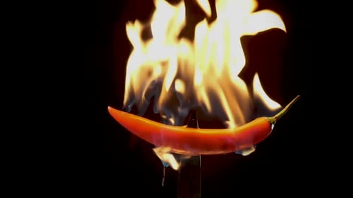 Red Chili Pepper on Fire, Dramatic Close-up