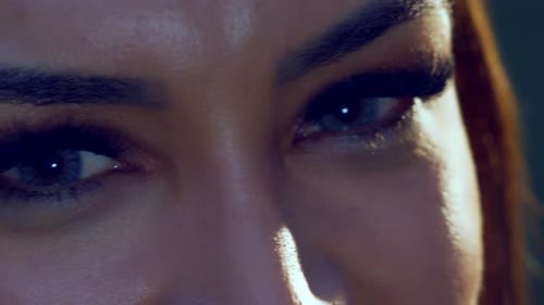 Close up of beautiful Hispanic girl's eyes, slow motion
