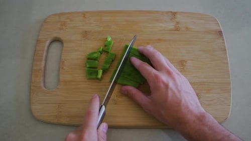 First Person POV Preparing Nopales/Cactus with Sharp Knife and Cutting Board