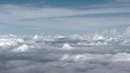 Observing the Clouds from an Airplane Window - POV