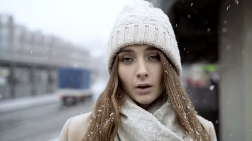 Young Beautiful Sad Girl Walking in the City, Winter Time 20s