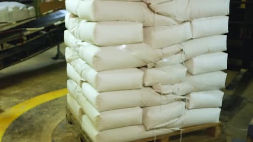 Pallet of White Bags Rotating on Platform