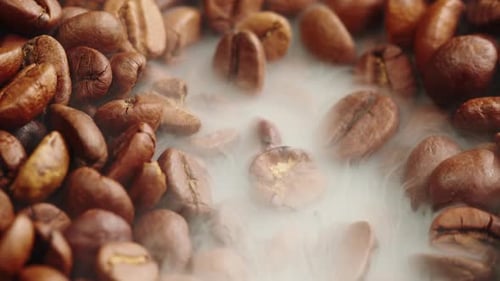 Roasting Coffee Beans with Smoke on Dark Background Close Up Arabica Robusta Colombian Beans