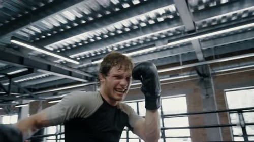 Pov view annoyed kickboxer showing aggression and making progress at gym