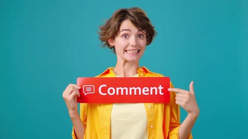 Female Blogger Shows Word Comment Inviting to Leave Opinion