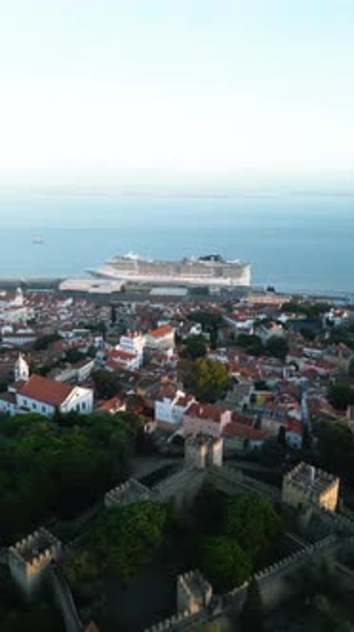 Aerial video in the center of the old city of Lisbon, with the Tagus River in the background