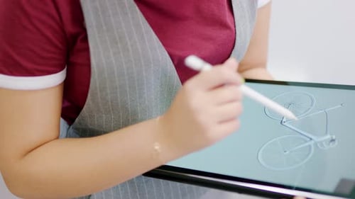 Tablet, pen and 3d graphic design of animation bicycle by tech, software or video game developer