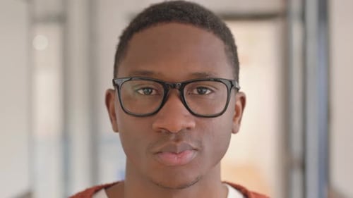 Face Close up of Serious African Man Looking at Camera