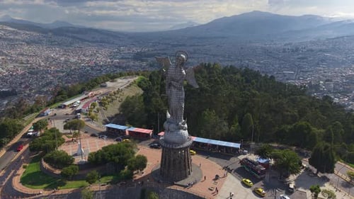 Aerial View of the Virgin of El Panecillo Statue in Quito with the City Sprawling Below Showing