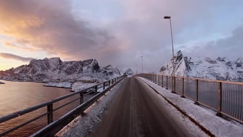 Explore the Frostkissed Panoramas of Lofoten Norway As your Journey Unfolds Along a Winter Road