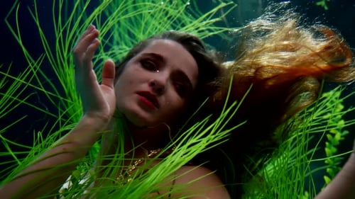 Beautiful Woman Sinking in Depth of Magical Sea or River Closeup View of Face Old Fairytale