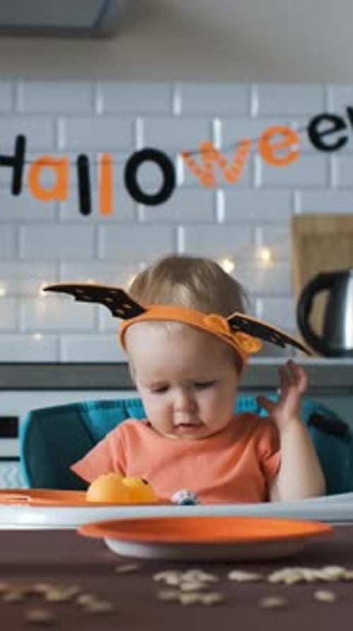 Adorable Baby Playing with Halloween Decoration Headband