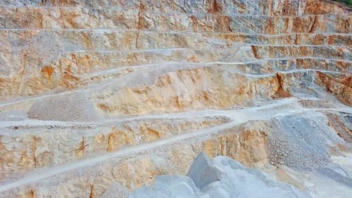 Natural Quarry is Located Near Road Against Backdrop of Rhodope Mountains and Hills with Forests and