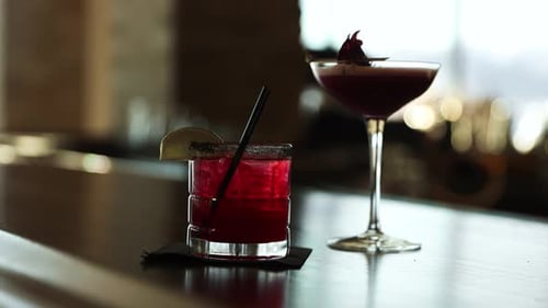 Fancy Alcohol Cocktails in Margarita Glass on Display at a Bar