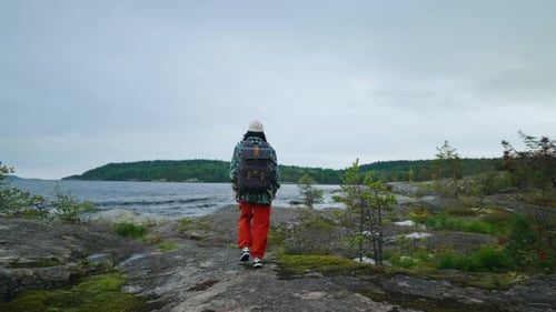Woman Traveller With Big Backpack Walking In Beautiful Place Admiring Nature And Silence Back View