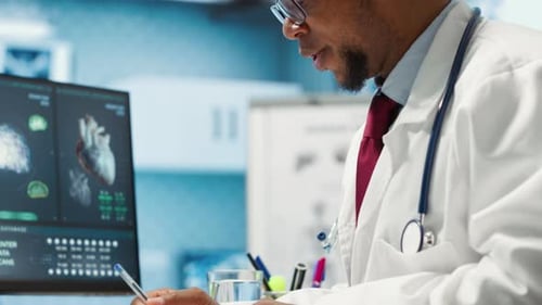 Male Physician Doing an x Ray Diagnostics Scan Interpretation During Check Up
