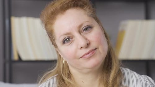 Close-up portrait of a smiling mature senior woman.