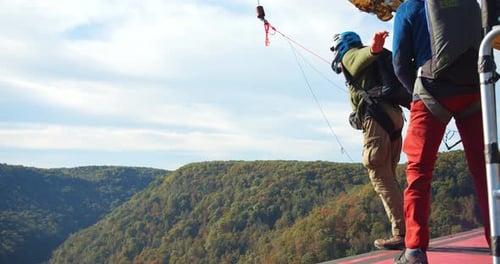 Fayetteville, Tennessee / Usa - November 14 2019: A Man Base Jumping Off Bridge With Parachute, S...