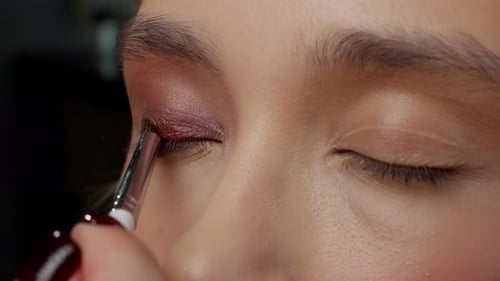 Applying Dark Eyeshadow Closeup