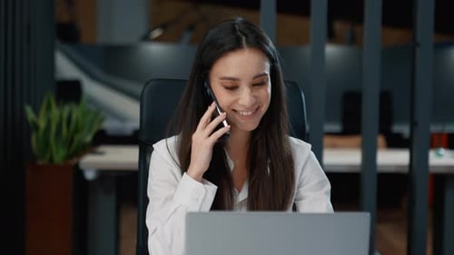 Happy Caucasian Businesswoman Talking Phone Call Looking in Laptop Smiling Business Woman Talk
