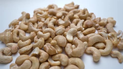 Fresh Cashew Nuts Slide View White Background