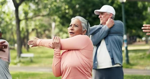 Fitness, yoga class and old people in park with stretching, wellness and training together