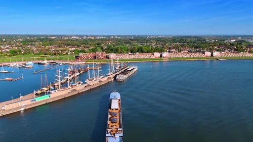 A barge heading to the port. Aerial perspective on the marina of Lelystad, the Netherlands