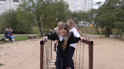 Group of Happy Children Playing in Summer Park