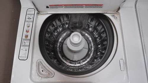 Loading Clothes in a Top Loading Washing Machine