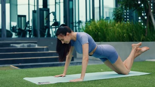 Woman Fitness Trainer Does Push Ups on Knees in Modern Gym Brunette Female Exercises Body Muscles