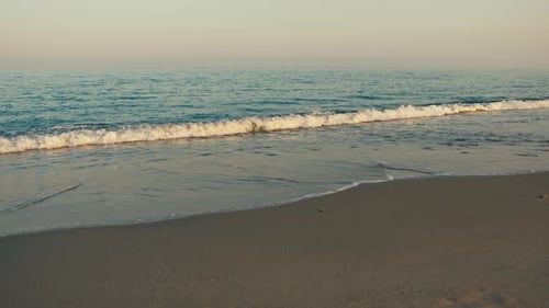 The Calm Waves on the Shore in Summer Italian Vacation Beach