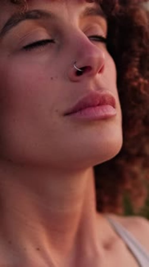 Vertical video, Woman Breathing Deeply in Sportswear