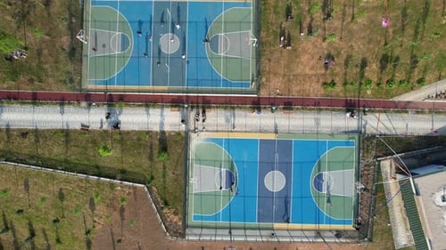 Playing Street Basketball in Public Park