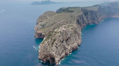 Lighthouse tower on headland