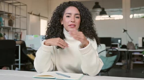 Happy Business Woman Having Video Call Meeting Talking to Web Cam in Office