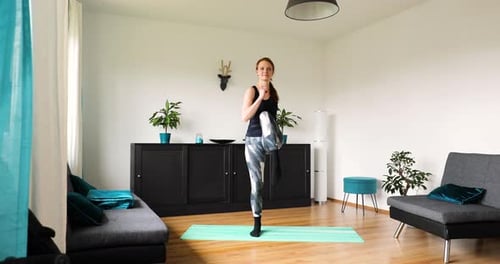 Woman Warming Up, Exercising at Home