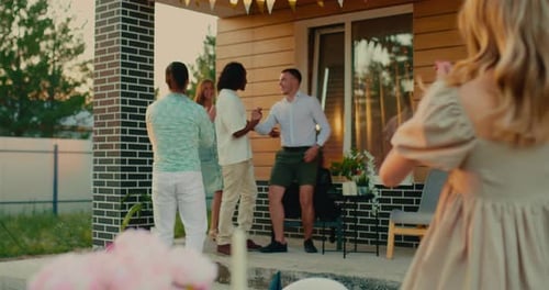 Group of Friends Celebrating Outdoor in Backyard