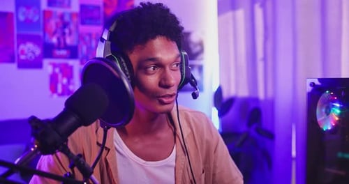 Young Adult with Microphone Headset Indoors