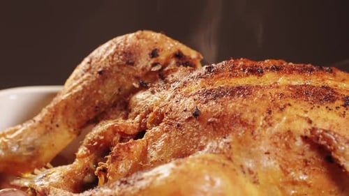 Full Roasted Grilled Chicken Meat in a Frying Pan with Potatoes Cooked Food Delicious Crust Sause